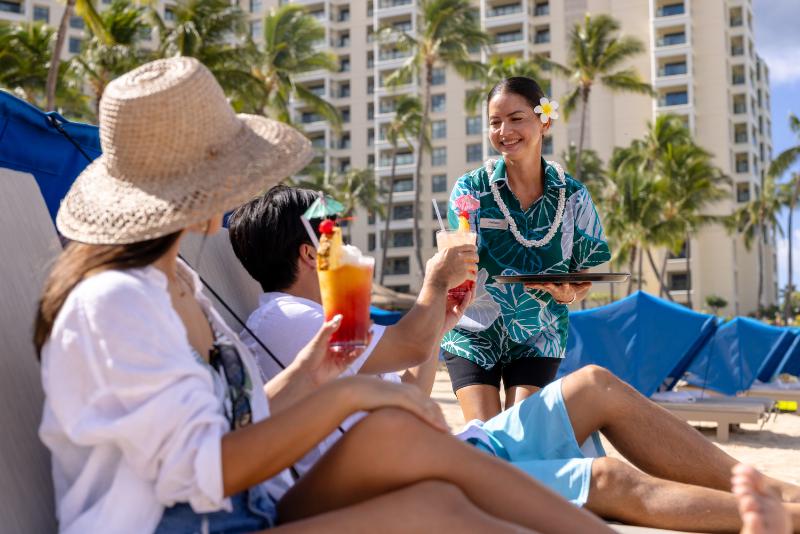 Marriott's Ko Olina Beach Club Couple Enjoying Poolside Service